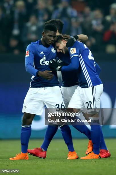 Marko Pjaca of Schalke celebrates the first goal with Breel Embolo and Franco Di Santo of Schalke during the Bundesliga match between FC Schalke 04...