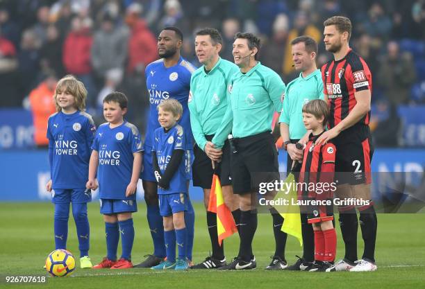 Leicester City captain Wes Morgan and AFC Bournemouth captain Simon Francis line up with match officials Andy Garratt, Lee Probert and Marc Perry...