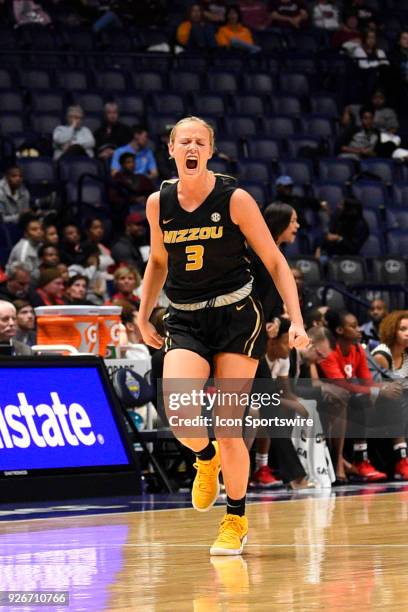 Missouri Tigers guard Sophie Cunningham screams as she runs down the court after making a big three point shot against the Georgia Bulldogs during...