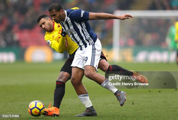 Etienne Capoue of Watford and Jose Salomon Rondon of West Bromwich Albion battle for the ball during the Premier League match between Watford and...