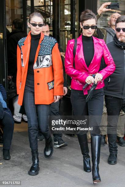 Models Gigi Hadid and Bella Hadid are seen leaving the 'Cafe de Flore' on March 3, 2018 in Paris, France.