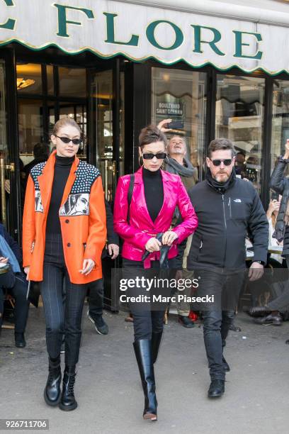 Models Gigi Hadid and Bella Hadid are seen leaving the 'Cafe de Flore' on March 3, 2018 in Paris, France.