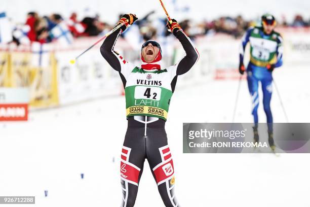 Bernhard Gruber of Austria reacts after the cross-country skiing of the men's Nordic Combined Team Sprint of the FIS World Cup in Lahti, Finland, on...