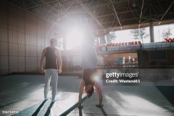 two men exercising in gym - floor gymnastics foto e immagini stock