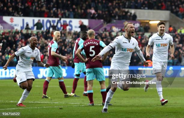 Mike van der Hoorn of Swansea City scores his sides second goal during the Premier League match between Swansea City and West Ham United at Liberty...