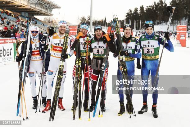 , second placed Jan Schmid ja and Joergen Graabak of Norway, winners Bernhard Gruber and Wilhelm Denifl of Austria and third placed Ilkka Herola and...