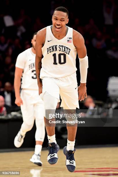 Tony Carr of the Penn State Nittany Lions celebrates giving his team a seven-point lead late in the game against the Northwestern Wildcats during the...