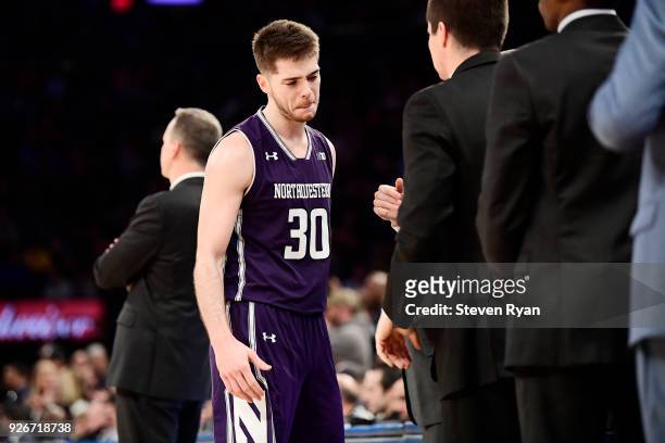 Bryant McIntosh of the Northwestern Wildcats reacts after coming out of the game against the Penn State Nittany Lions during the second round of the...