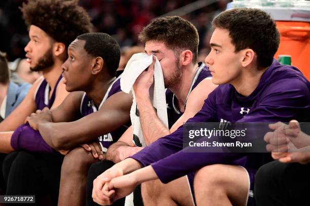 Bryant McIntosh of the Northwestern Wildcats reacts after coming out of the game against the Penn State Nittany Lions during the second round of the...