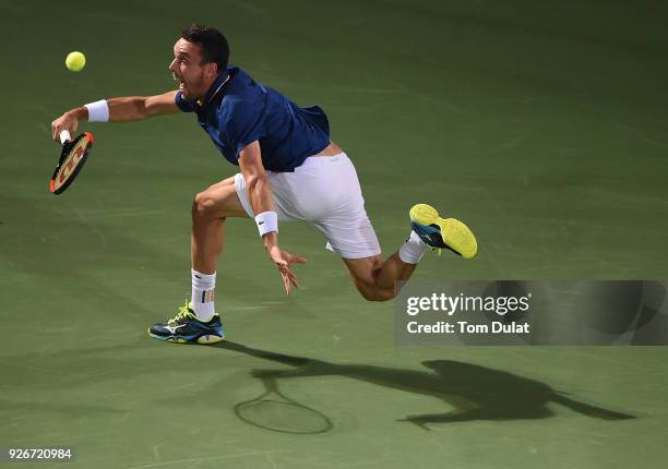Roberto Bautista Agut of Spain plays a forehand during his final match against Lucas Pouille of France on day six of the ATP Dubai Duty Free Tennis...