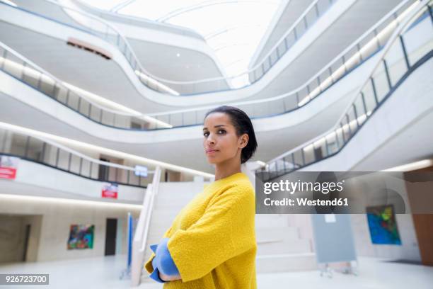 portrait of student in university - leuchtende farbe stock-fotos und bilder