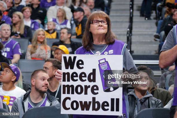 Sacramento Kings fan holds up a sign asking for more cowbells during the game against the Los Angeles Lakers on February 24, 2018 at Golden 1 Center...
