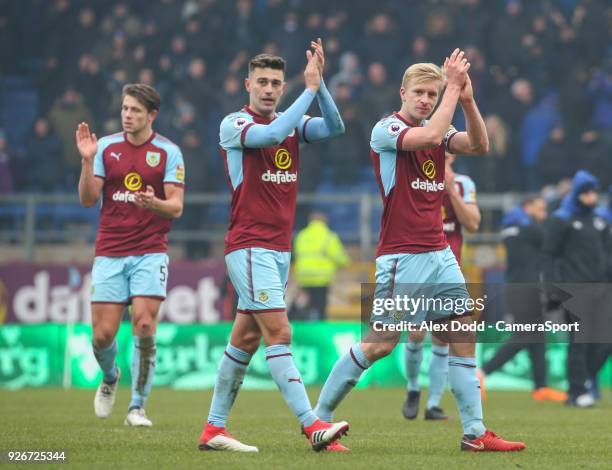 Burnley's Ben Mee, Matthew Lowton and James Tarkowski applaud the fans after the match during the Premier League match between Burnley and Everton at...