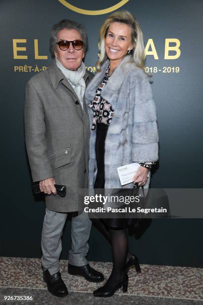 Jean-Daniel Lorieux and his wife attends the Elie Saab show as part of the Paris Fashion Week Womenswear Fall/Winter 2018/2019 on March 3, 2018 in...