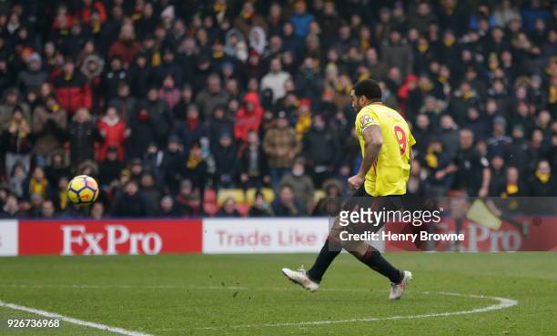 Troy Deeney of Watford scores a penalty for his sides first goal during the Premier League match between Watford and West Bromwich Albion at Vicarage...