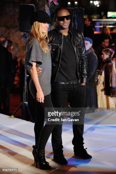 Taio Cruz and guest arrive for the World Film Premiere of Disney's 'A Christmas Carol' at the Odeon Leicester Square on November 3, 2009 in London,...