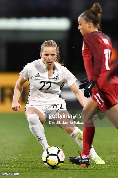 Tabea Kemme of Germany defends against the US National Team on March 1, 2018 at MAPFRE Stadium in Columbus, Ohio. The United States defeated Germany...