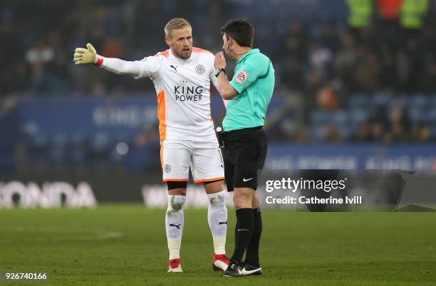 Kasper Schmeichel of Leicester City confronts referee Lee Probert during the Premier League match between Leicester City and AFC Bournemouth at The...