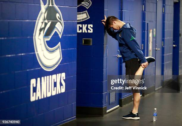 Nikolay Goldobin of the Vancouver Canucks stretches before their NHL game against the Colorado Avalanche at Rogers Arena February 20, 2018 in...
