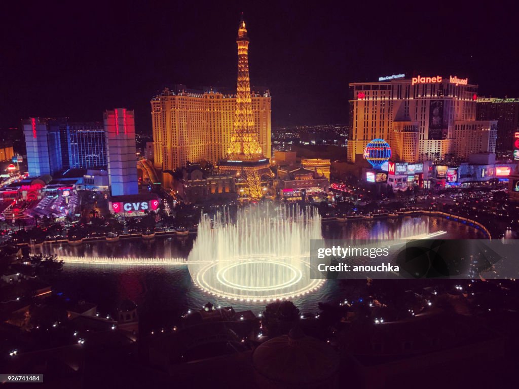 Las Vegas strip at night, Bellagio fountains and Paris Las Vegas Hotel, USA