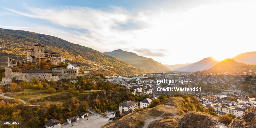 Switzerland, Canton Vaud, Sion, townscape with Notre-Dame de Valere at sunset