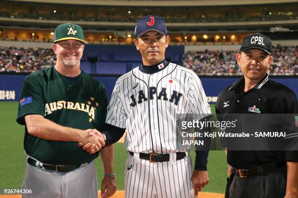 Japan Manager Atsunori Inaba and Australia Manager Steven Fish sakes hand during the game one of the baseball international match between Japan And...