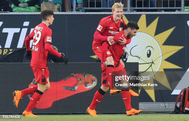 Julian Brandt of Leverkusen jubilates with team mates after scoring the second goal during the Bundesliga match between VfL Wolfsburg and Bayer 04...