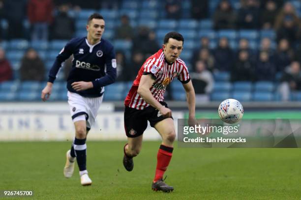 George Honeyman of Sunderland gets away from Shaun Williams of Millwall during the Sky Bet Championship match between Millwall and Sunderland at The...