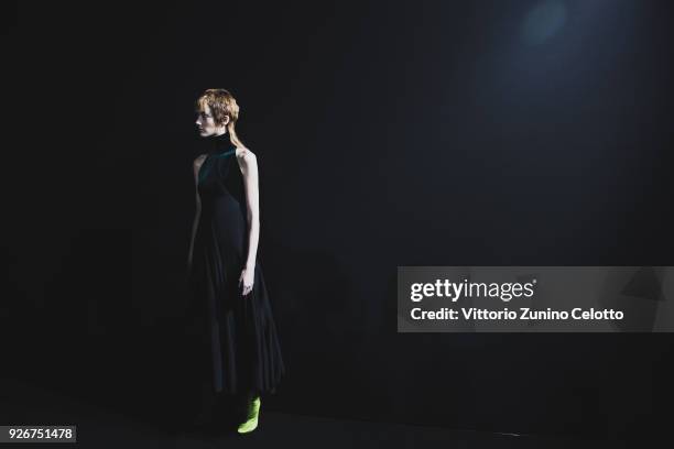 Model prepares backstage before the Haider Ackermann show as part of the Paris Fashion Week Womenswear Fall/Winter 2018/2019 on March 3, 2018 in...