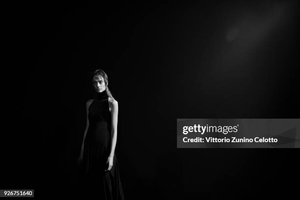 Model prepares backstage before the Haider Ackermann show as part of the Paris Fashion Week Womenswear Fall/Winter 2018/2019 on March 3, 2018 in...