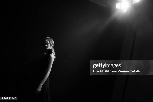 Model prepares backstage before the Haider Ackermann show as part of the Paris Fashion Week Womenswear Fall/Winter 2018/2019 on March 3, 2018 in...