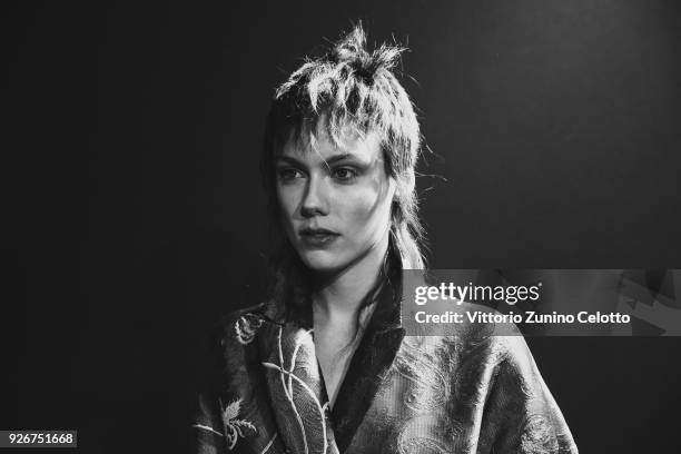 Model prepares backstage before the Haider Ackermann show as part of the Paris Fashion Week Womenswear Fall/Winter 2018/2019 on March 3, 2018 in...