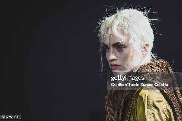 Model prepares backstage before the Haider Ackermann show as part of the Paris Fashion Week Womenswear Fall/Winter 2018/2019 on March 3, 2018 in...