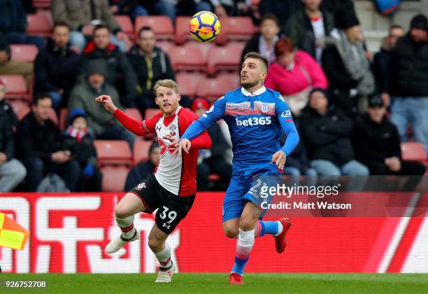Josh Sims of Southampton and Konstantinos Stafylidis of Stoke during the Premier League match between Southampton and Stoke City at St Mary's Stadium...