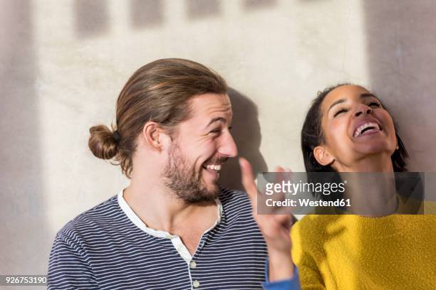 young couple having fun - ambient light stock pictures, royalty-free photos & images