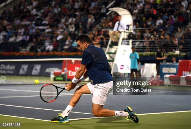 Roberto Bautista Agut of Spain plays a backhand during his final match against Lucas Pouille of France on day six of the ATP Dubai Duty Free Tennis...