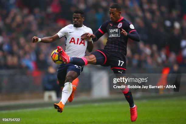 Serge Aurier of Tottenham Hotspur and Rajiv Van La Parra of Huddersfield Town during the Premier League match between Tottenham Hotspur and...