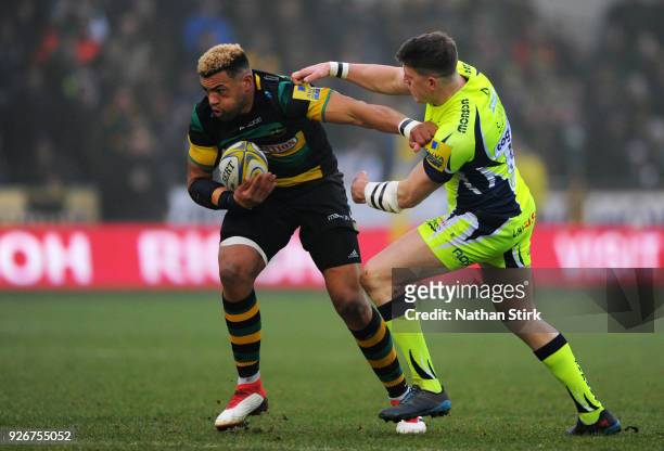 Luther Burrell of Northampton Saints in action during the Aviva Premiership match between Northampton Saints and Sale Sharks at Franklin's Gardens on...