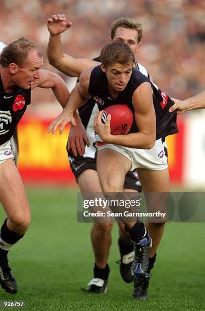 Matthew Lappin for Carlton in action during round six of the AFL season match played between the Collingwood Magpies and the Carlton Blues held at...