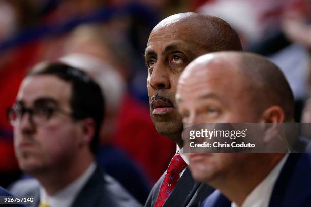 Associate head coach Lorenzo Romar of the Arizona Wildcats watches the action during the college basketball game against the Stanford Cardinal at...