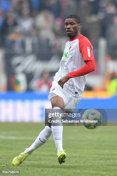 Kevin Danso of Augsburg plays the ball during the Bundesliga match between FC Augsburg and TSG 1899 Hoffenheim at WWK-Arena on March 3, 2018 in...