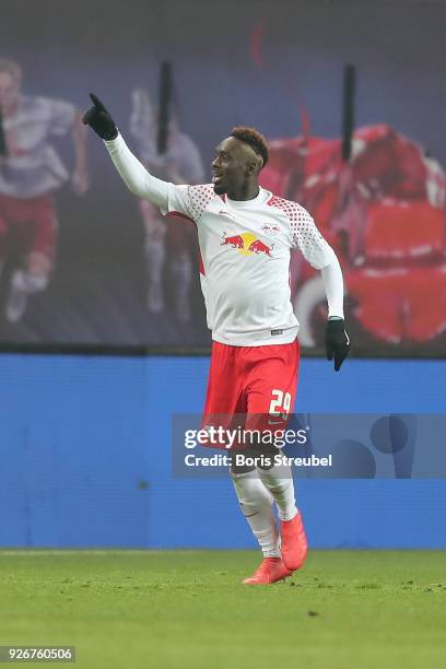 Jean-Kevin Augustin of Leipzig celebrates after he scored a goal to make it 1:0 during the Bundesliga match between RB Leipzig and Borussia Dortmund...