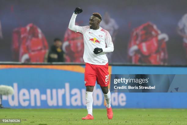 Jean-Kevin Augustin of Leipzig celebrates after he scored a goal to make it 1:0 during the Bundesliga match between RB Leipzig and Borussia Dortmund...