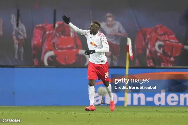 Jean-Kevin Augustin of Leipzig celebrates after he scored a goal to make it 1:0 during the Bundesliga match between RB Leipzig and Borussia Dortmund...