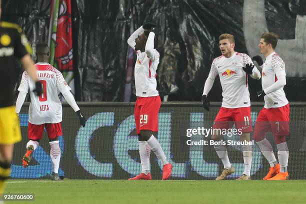 Jean-Kevin Augustin of Leipzig celebrates after he scored a goal to make it 1:0 during the Bundesliga match between RB Leipzig and Borussia Dortmund...