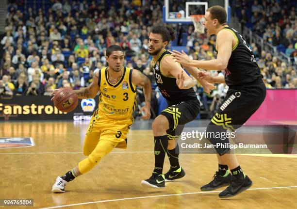 Peyton Siva of Alba Berlin, Assem Marei and Robin Amaize of medi Bayreuth during the easyCredit BBL game between Alba Berlin and medi Bayreuth at...