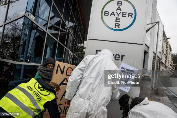 Demonstration in front of the headquarters of the Bayer company against the merger with the Monsanto company in Lyon, France, on March 3rd, 2018.