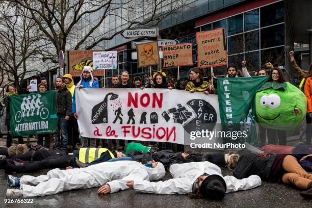 Demonstration in front of the headquarters of the Bayer company against the merger with the Monsanto company in Lyon, France, on March 3rd, 2018.