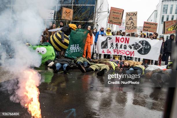 Demonstration in front of the headquarters of the Bayer company against the merger with the Monsanto company in Lyon, France, on March 3rd, 2018.