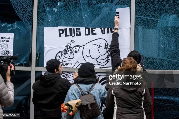 Demonstration in front of the headquarters of the Bayer company against the merger with the Monsanto company in Lyon, France, on March 3rd, 2018.